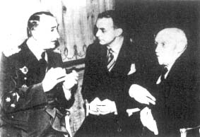 Premier królewskiego rządu Jugosławii – gen. Duszan Simović, brytyjski dziennikarz „Daily Mail” – Ward Price oraz wicepremier prof. Slobodan Jovanović na przyjęciu w hotelu Savoy, 26 sierpnia 1941 w Londynie.